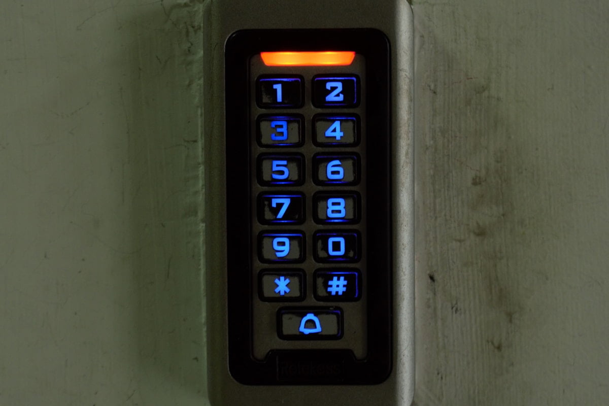 A backlit code keypad at an entrance, so people you trust can key themselves in.